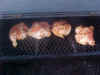 Chicken on pit.jpg (45080 bytes)